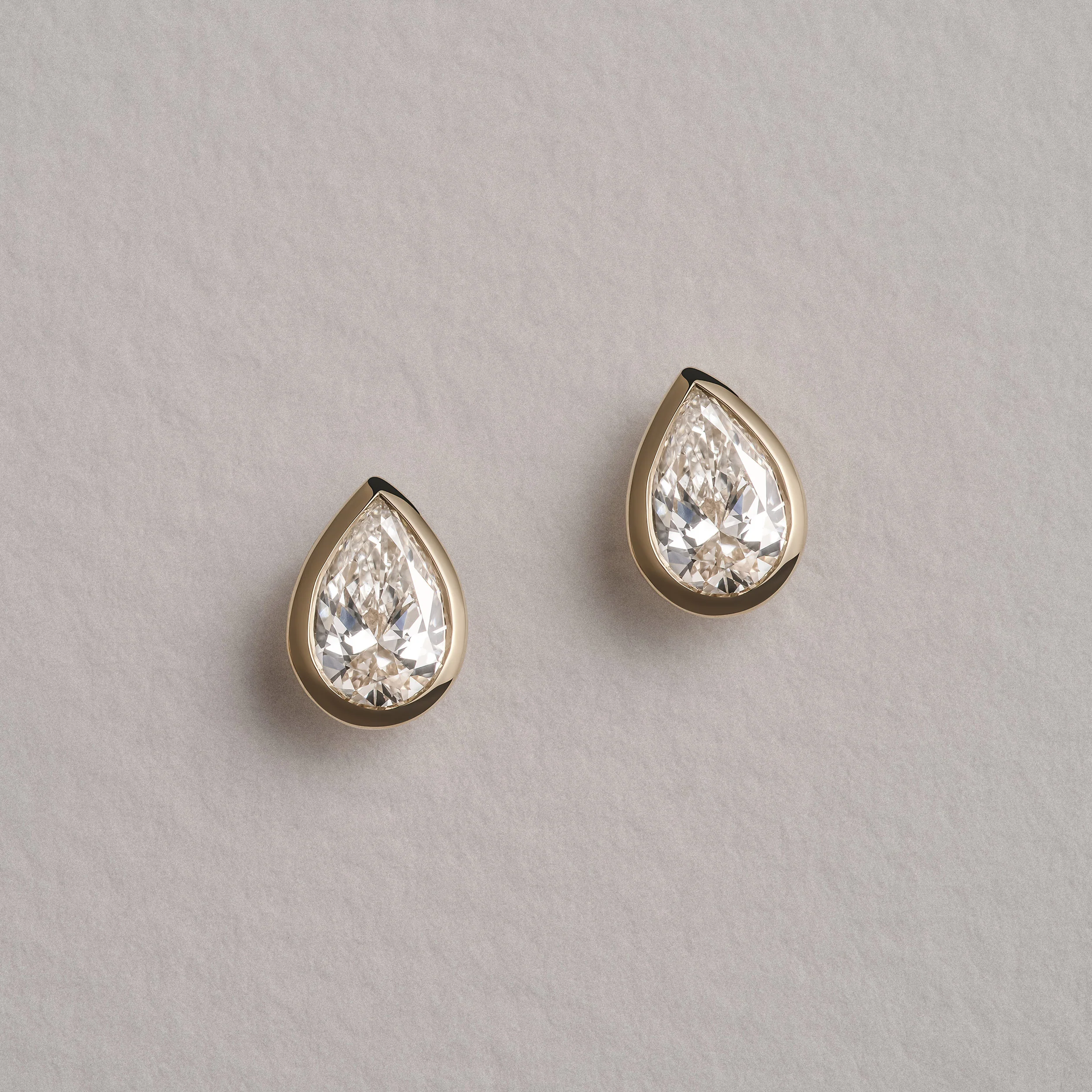 Bezel Set 1.00ct Pear Cut Lab Diamond Stud Earrings in 18K Yellow Gold - Image 8