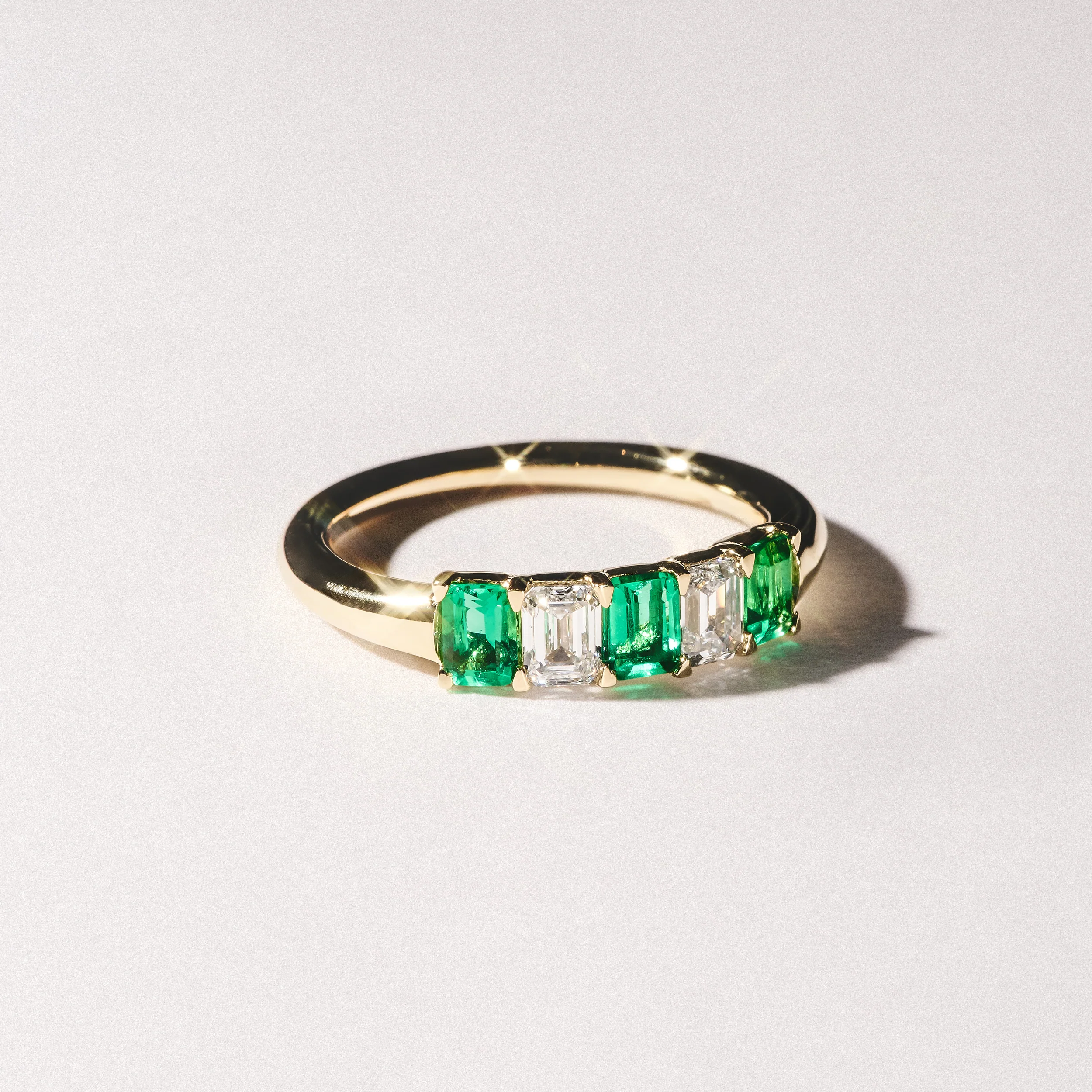 Solene 0.75ct Emerald Cut Lab Emerald and Lab Diamond Half Eternity Ring in 18K Yellow Gold - Image 8